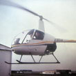 Jean Moine en compagnie de Jean-Marie Potelle en vol  bord d'un R22 F-GCLK - Photo  X - Collection JMP - En cas d'observation sur le copyright de cette photo merci de nous contacter